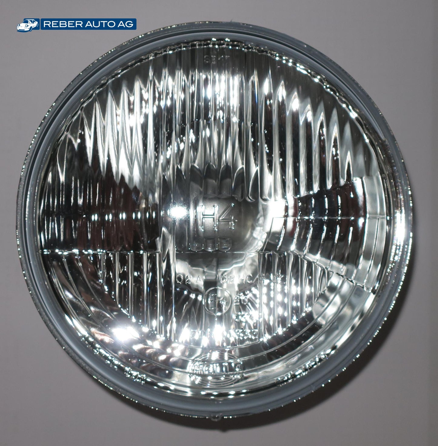 HELLA H4 Halogen Scheinwerfereinsatz Mazda MX-5 NA Detail
