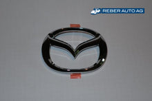 Mazda Emblem Stossfänger vorne 98-00